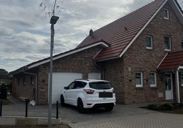Einfamilienhaus mit Garage in Osterbrock, Straßenansicht